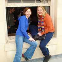 The congresswoman said we should go out on the balcony and check out the view of the Capitol dome.  I wouldn't call it a balcony.  She really meant "climb out the window behind by desk and walk around on the roof."  It was fun!